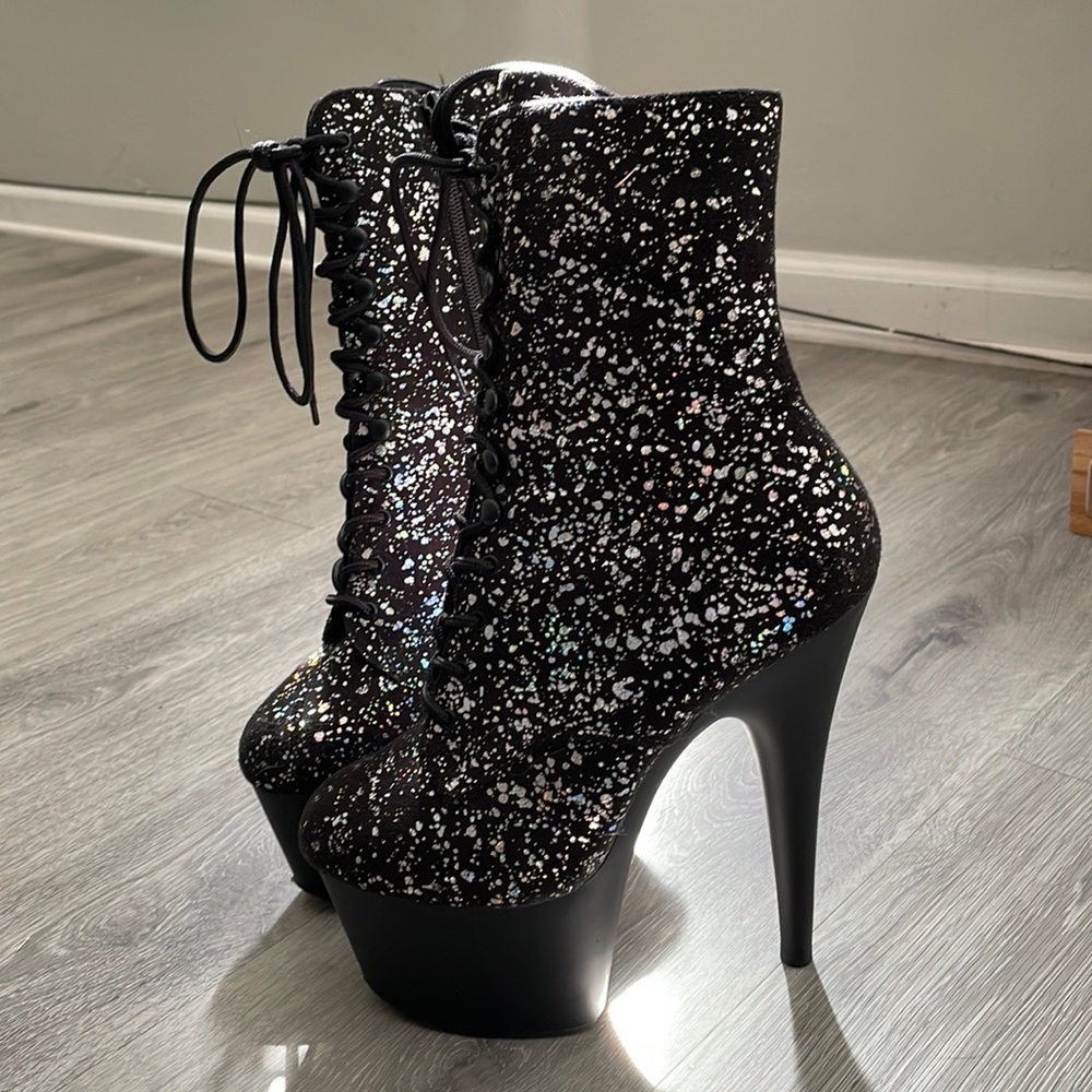 Pleaser dancing black iridescent heeled boots. In like new condition.